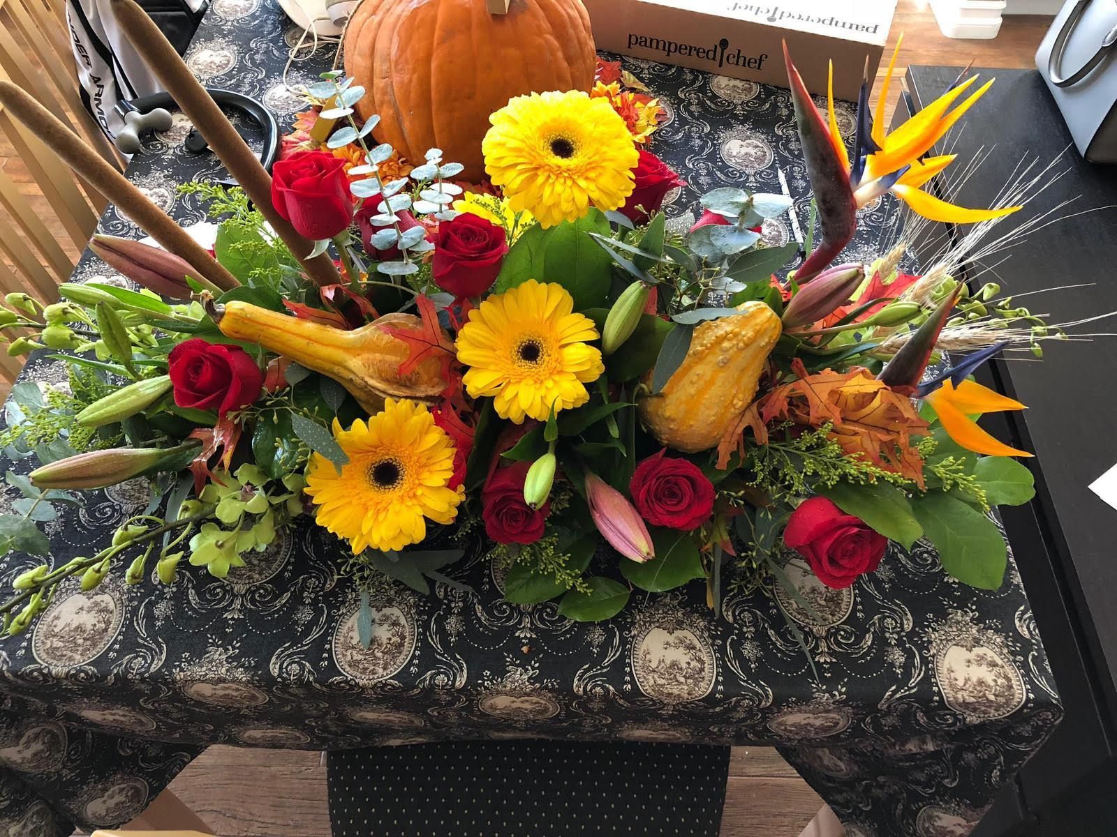Sunflower and tropical arrangement